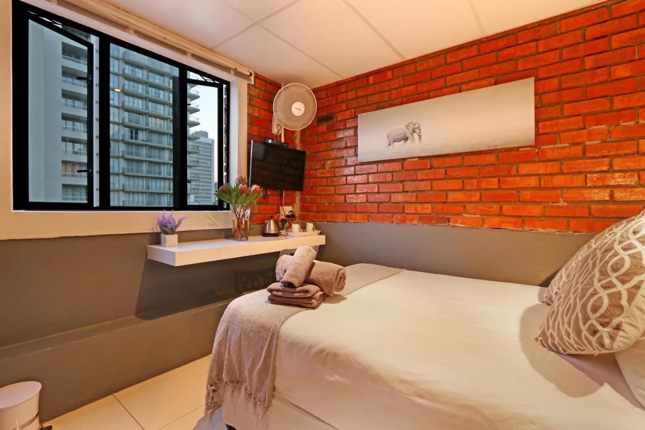 The Rhino Hotel & Apartments Le Cap Extérieur photo